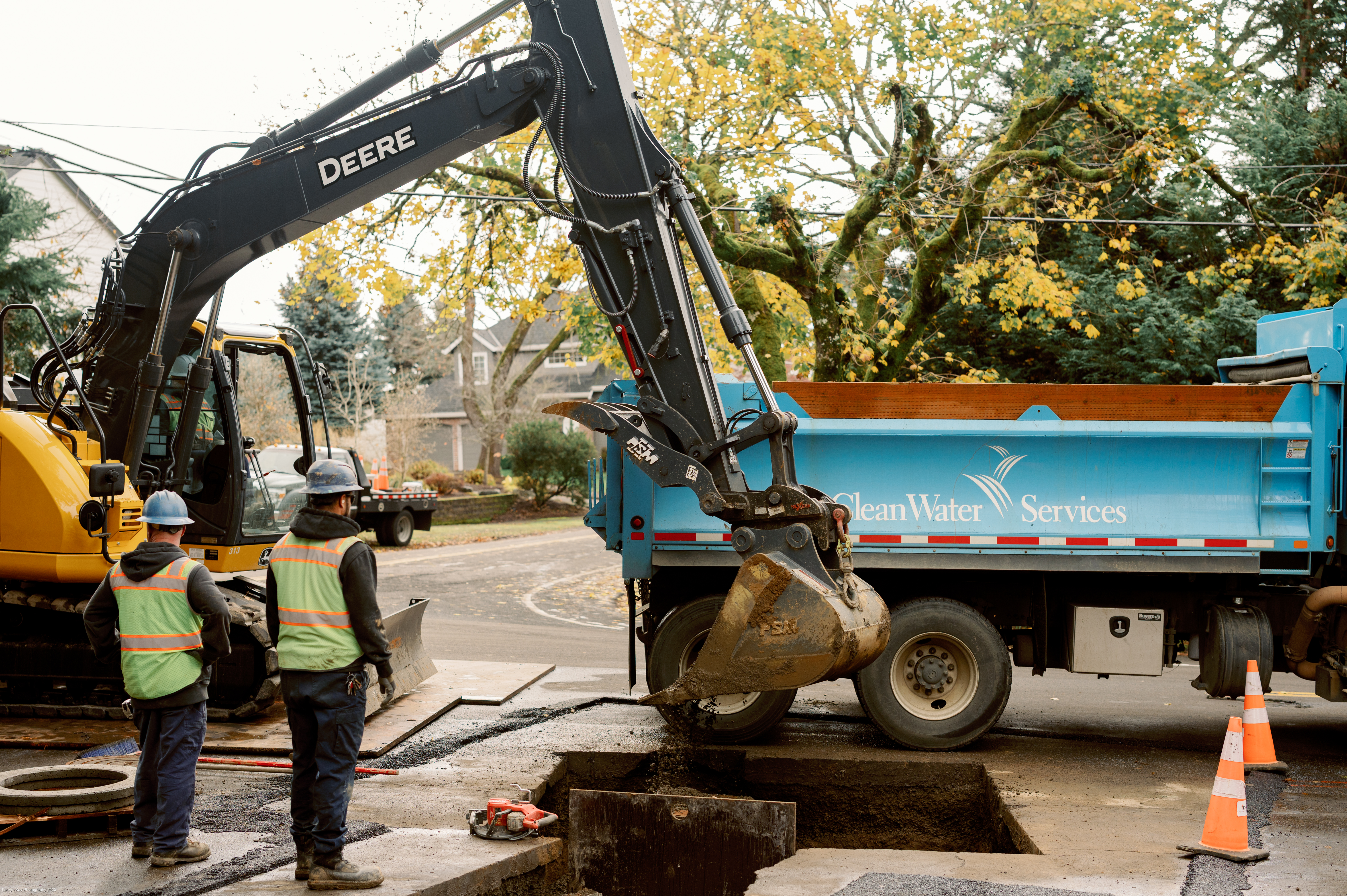 An image of two Clean Water Services at a construction site in the community.